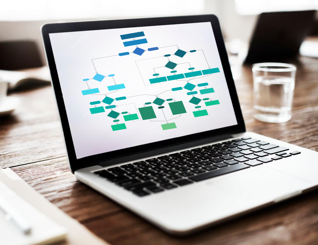 Laptop with sitemap graphic on table